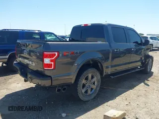 2020 Ford F-150 XL with VIN 1FTEW1E50LKE93170, listed as a IAAI auction lot 41918973 with 99,117 mi miles and . Bid and sale history available at carsss.com. Image 4.