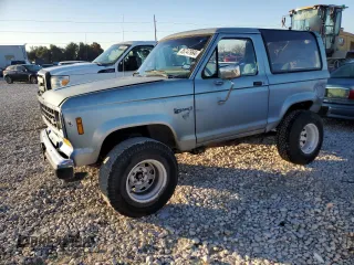 1987 Ford Bronco z VIN 1FMCU12T1HUA12785, wystawiony jako Copart lot #85747984 z przebiegiem Nie podano mil oraz Szkoda całkowita • Salvage title. Historia ofert i sprzedaży dostępna na DreamBid. Obrazek 1.