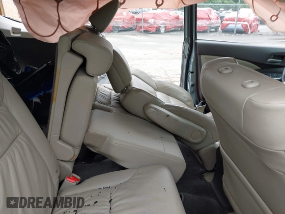 2012 Honda CR-V EX-L with VIN 2HKRM4H78CH601054, listed as a IAAI auction lot 42444157 with 113,491 mi miles and . Bid and sale history available at DreamBid. Image 8.