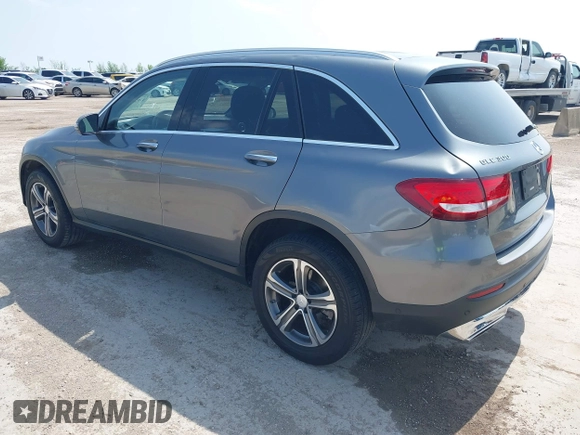 2016 Mercedes-Benz GLC with VIN WDC0G4JB4GF084697, listed as a IAAI auction lot 41929271 with 129,146 mi miles. Bid and sale history available at carsss.com. Image 3.