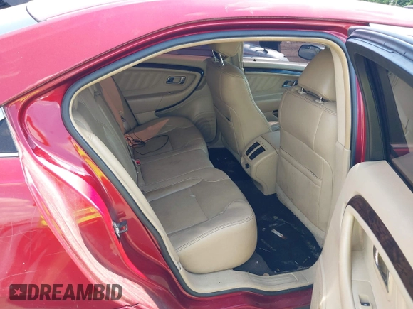 2013 Ford Taurus Limited with VIN 1FAHP2F8XDG205853, listed as a IAAI auction lot 42674121 with 211,637 mi miles and . Bid and sale history available at DreamBid. Image 8.
