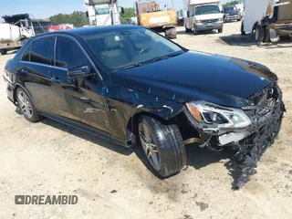 2014 Mercedes-Benz E 550 Sport with VIN WDDHF9BB2EA998695, listed as a IAAI auction lot 41683646 with 153,265 mi miles and . Bid and sale history available at DreamBid. Image 1.