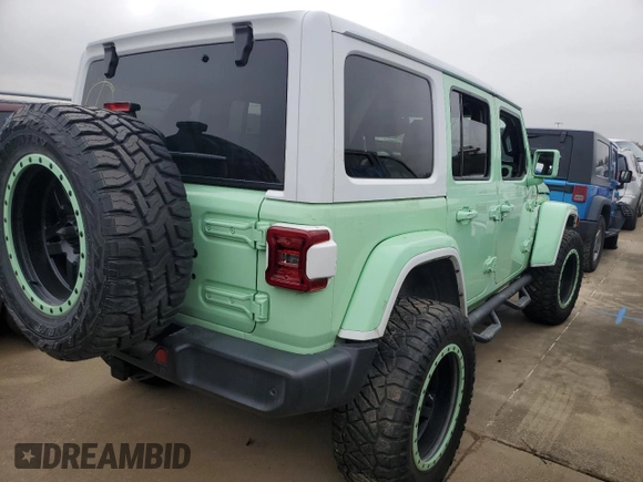 2018 Jeep Wrangler Unlimited Sahara z VIN 1C4HJXEN2JW211387, wystawiony jako Copart lot #42776935 z przebiegiem 66 170 mil mil oraz Szkoda całkowita • Salvage title. Historia ofert i sprzedaży dostępna na DreamBid. Obrazek 3.