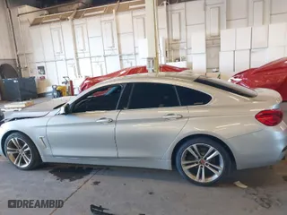 2019 BMW 4 Series 430i with VIN WBA4J1C57KBM12013, listed as a IAAI auction lot 41265905 with 110,706 mi miles. Bid and sale history available at carsss.com. Image 14.