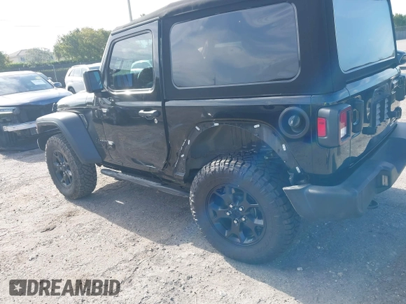 2021 Jeep Wrangler Sport z VIN 1C4GJXAN7MW796019, wystawiony jako IAAI lot #42172407 z przebiegiem 34 128 mil mil oraz . Historia ofert i sprzedaży dostępna na DreamBid. Obrazek 6.