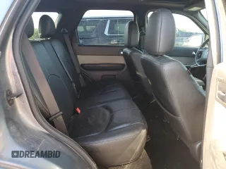 2010 Mercury Mariner Premier with VIN 4M2CN9HG7AKJ07163, listed as a Copart auction lot 62384925 with 113,591 mi miles and Salvage title. Bid and sale history available at DreamBid. Image 10.