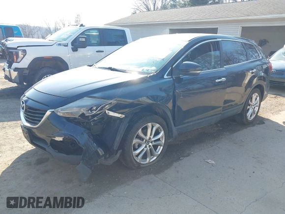 2013 Mazda CX-9 Grand Touring with VIN JM3TB3DA5D0407272, listed as a IAAI auction lot 41760028 with 188,900 mi miles and . Bid and sale history available at carsss.com. Image 2.