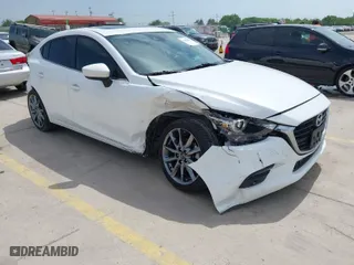 2018 Mazda Mazda3 4-Door Grand Touring with VIN 3MZBN1W30JM195076, listed as a IAAI auction lot 41928632 with 58,681 mi miles. Bid and sale history available at carsss.com. Image 1.