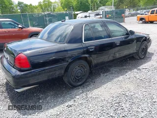 2005 Ford Police Interceptor z VIN 2FAHP71WX5X158807, wystawiony jako IAAI lot #42282107 z przebiegiem 153 787 mil mil oraz . Historia ofert i sprzedaży dostępna na DreamBid. Obrazek 4.