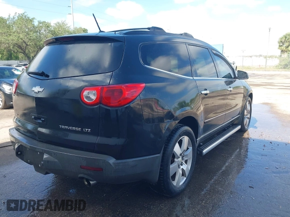 2011 Chevrolet Traverse LTZ z VIN 1GNKVLED9BJ392357, wystawiony jako IAAI lot #42155624 z przebiegiem Nie podano mil oraz . Historia ofert i sprzedaży dostępna na DreamBid. Obrazek 4.