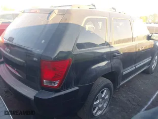 2009 Jeep Grand Cherokee Laredo with VIN 1J8GS48K49C536203, listed as a IAAI auction lot 41019376 with 1 mi miles. Bid and sale history available at carsss.com. Image 4.
