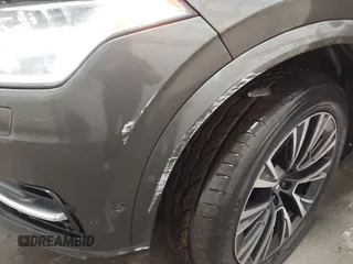 2018 Volvo XC90 Momentum with VIN YV4102XK1J1323053, listed as a IAAI auction lot 41145820 with 117,538 mi miles and . Bid and sale history available at DreamBid. Image 6.