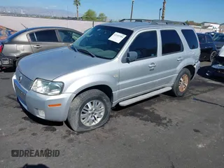 2007 Mercury Mariner Premier z VIN 4M2CU87147KJ12646, wystawiony jako IAAI lot #42193789 z przebiegiem 172 771 mil mil oraz . Historia ofert i sprzedaży dostępna na DreamBid. Obrazek 2.