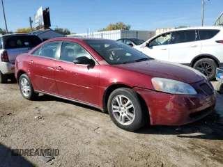 2005 Pontiac G6 with VIN 1G2ZG528054173847, listed as a Copart auction lot 77558494 with 84,527 mi miles and Salvage Title. Bid and sale history available at carsss.com. Image 4.