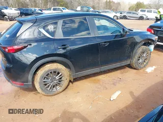 2020 Mazda CX-5 Touring z VIN JM3KFBCMXL1741182, wystawiony jako IAAI lot #41602315 z przebiegiem 31 582 mil mil oraz . Historia ofert i sprzedaży dostępna na DreamBid. Obrazek 4.