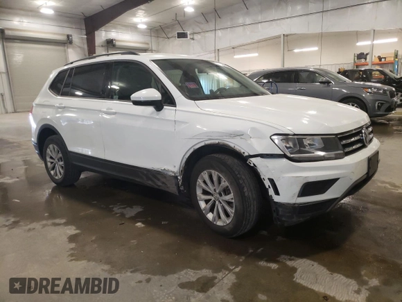 2018 Volkswagen Tiguan S with VIN 3VV1B7AX4JM118670, listed as a Copart auction lot 57055935 with 104,443 mi miles and Salvage title. Bid and sale history available at DreamBid. Image 4.