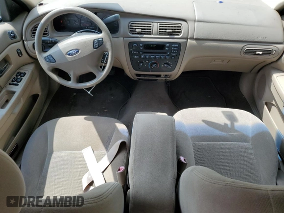 2003 Ford Taurus SES Standard z VIN 1FAFP55U33A123732, wystawiony jako Copart lot #58837395 z przebiegiem 169 159 mil mil oraz Szkoda całkowita • Salvage title. Historia ofert i sprzedaży dostępna na DreamBid. Obrazek 8.