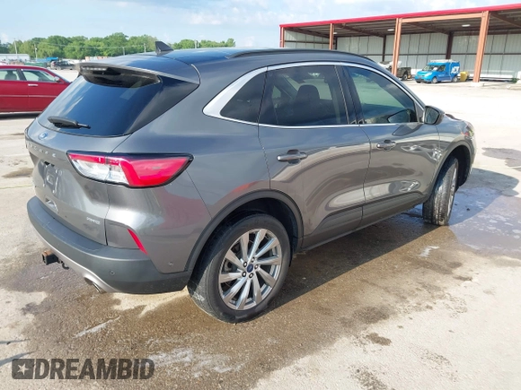 2022 Ford Escape Titanium with VIN 1FMCU9J90NUB35428, listed as a IAAI auction lot 42255369 with 33,662 mi miles and . Bid and sale history available at DreamBid. Image 4.