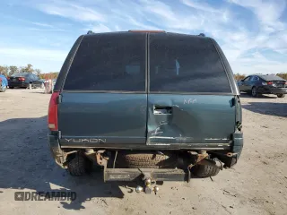 1999 GMC Denali z VIN 1GKEK13R3XR908307, wystawiony jako Copart lot #78595094 z przebiegiem 138 098 mil mil oraz Szkody całkowita. Historia ofert i sprzedaży dostępna na DreamBid. Obrazek 6.