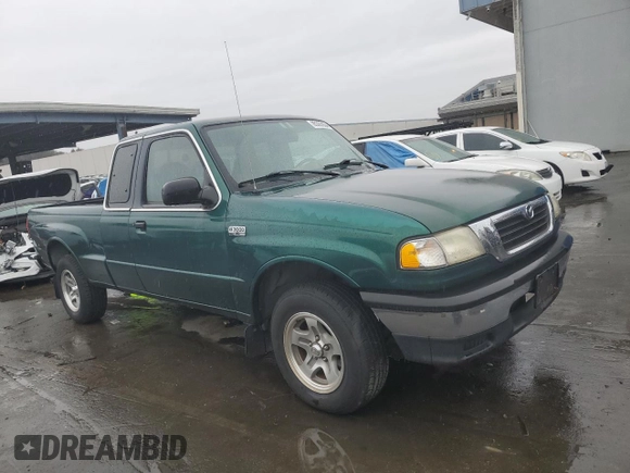 1999 Mazda B-Series 2WD Truck SE with VIN 4F4YR16V4XTM02282, listed as a Copart auction lot 85363034 with 102,923 mi miles and Clean Title. Bid and sale history available at carsss.com. Image 4.