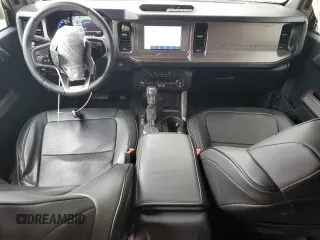 2023 Ford Bronco z VIN 1FMDE5BH0PLB30495, wystawiony jako Copart lot #51380065 z przebiegiem 18 156 mil mil oraz Szkoda całkowita • Salvage title. Historia ofert i sprzedaży dostępna na DreamBid. Obrazek 8.