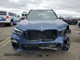 2021 BMW X5 M50i with VIN 5UXJU4C03M9E52555, listed as a Copart auction lot 48171365 with 64,731 mi miles and Salvage Title. Bid and sale history available at carsss.com. Image 5.
