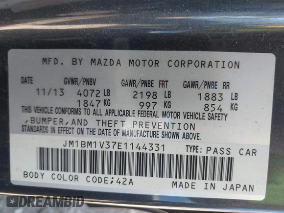 2014 Mazda 3 S Touring with VIN JM1BM1V37E1144331, listed as a IAAI auction lot 41880673 with 102,963 mi miles and . Bid and sale history available at DreamBid. Image 9.