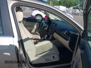 2014 Volkswagen Jetta SportWagen TDI w/Sunroof & Nav with VIN 3VWPL7AJ7EM614938, listed as a IAAI auction lot 42121788 with 189,917 mi miles. Bid and sale history available at carsss.com. Image 5.
