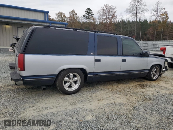1994 GMC Suburban z VIN 1GKEC16K4RJ762562, wystawiony jako Copart lot #81242184 z przebiegiem 182 583 mil mil oraz Szkoda całkowita • Salvage title. Historia ofert i sprzedaży dostępna na DreamBid. Obrazek 3.