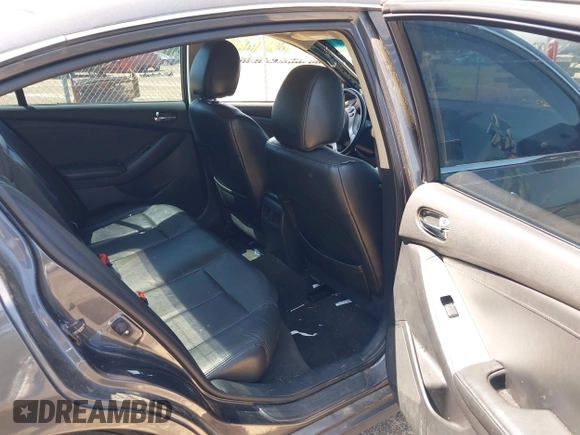 2009 Nissan Altima SL with VIN 1N4AL21E79N420006, listed as a IAAI auction lot 41963835 with 128,962 mi miles and . Bid and sale history available at DreamBid. Image 8.