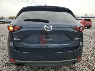 2017 Mazda CX-5 Grand Touring with VIN JM3KFADL3H0125143, listed as a Copart auction lot 50178005 with 160,058 mi miles and Salvage Title. Bid and sale history available at carsss.com. Image 6.