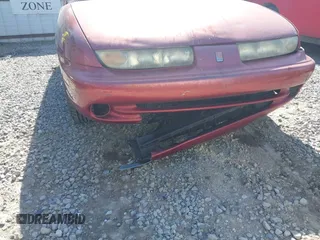 1998 Saturn SL z VIN 1G8ZK5270WZ223002, wystawiony jako IAAI lot #41959507 z przebiegiem Nie podano mil oraz . Historia ofert i sprzedaży dostępna na DreamBid. Obrazek 6.