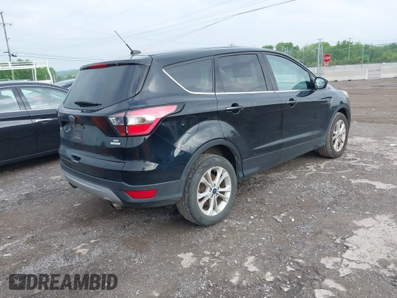 2017 Ford Escape SE with VIN 1FMCU0GD0HUB90702, listed as a IAAI auction lot 42141383 with 174,265 mi miles. Bid and sale history available at carsss.com. Image 4.