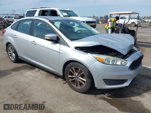 2015 Ford Focus SE with VIN 1FADP3F24FL203509, listed as a IAAI auction lot 41765582 with 139,856 mi miles. Bid and sale history available at carsss.com. Image 1.