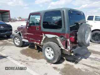 2001 Jeep Wrangler SE с VIN 1J4FA29P21P300094, выставлен на аукционе IAAI как лот 41871446 с пробегом 125 098 миль миль и . История ставок и продаж доступна на DreamBid. Изображение 3.