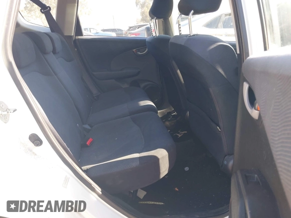 2009 Honda Fit Sport w/Navi with VIN JHMGE88679S067041, listed as a IAAI auction lot 41877402 with 162,485 mi miles. Bid and sale history available at carsss.com. Image 8.