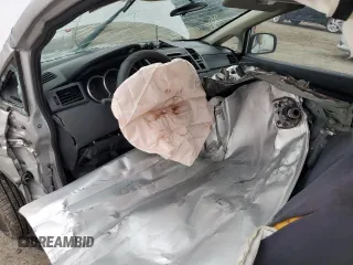 2009 Nissan Versa 1.6 z VIN 3N1CC11E49L492412, wystawiony jako Copart lot #47807175 z przebiegiem Nie podano mil oraz Szkoda całkowita • Salvage title. Historia ofert i sprzedaży dostępna na DreamBid. Obrazek 8.