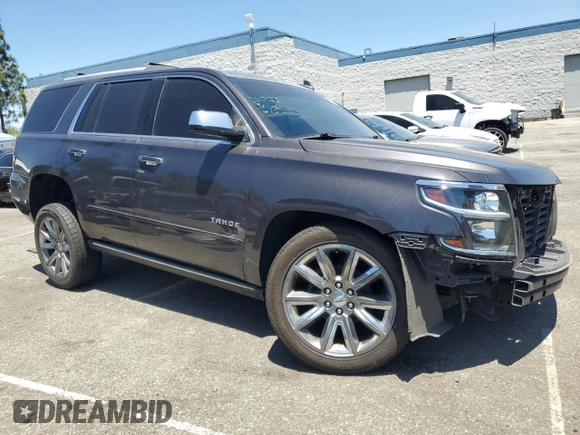 2017 Chevrolet Tahoe Premier with VIN 1GNSCCKC7HR241402, listed as a Copart auction lot 63127315 with 127,273 mi miles and Salvage title. Bid and sale history available at DreamBid. Image 4.