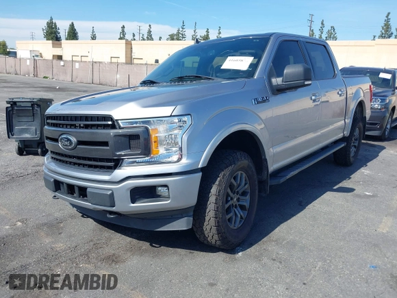 2020 Ford F-150 XL with VIN 1FTEW1E43LKE80078, listed as a IAAI auction lot 41603818 with 66,912 mi miles. Bid and sale history available at carsss.com. Image 2.