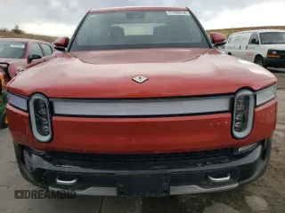 2023 Rivian R1T Adventure with VIN 7FCTGAAA2PN026211, listed as a Copart auction lot 77705414 with Not Provided miles and Salvage Title. Bid and sale history available at DreamBid. Image 5.