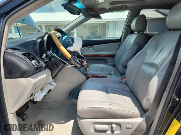 2005 Lexus RX 330 with VIN 2T2GA31U85C021864, listed as a Copart auction lot 59857965 with 135,756 mi miles and Salvage title. Bid and sale history available at DreamBid. Image 7.