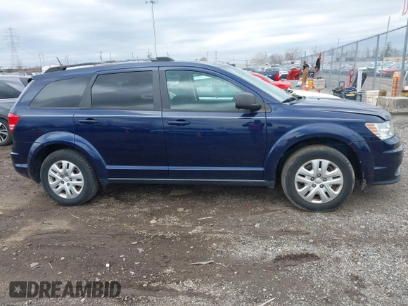 2017 Dodge Journey SE with VIN 3C4PDCAB9HT590394, listed as a IAAI auction lot 41838214 with 71,442 mi miles and . Bid and sale history available at DreamBid. Image 13.