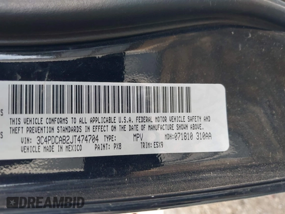 2018 Dodge Journey SE with VIN 3C4PDCAB2JT474704, listed as a IAAI auction lot 41926166 with 91,747 mi miles. Bid and sale history available at carsss.com. Image 9.