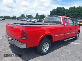 1997 Ford F-150 XL with VIN 1FTDX1869VNA11343, listed as a IAAI auction lot 42660458 with 105,924 mi miles and . Bid and sale history available at DreamBid. Image 4.