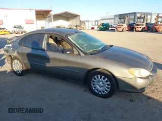 2003 Ford Taurus LX Standard with VIN 1FAFP52U33A235063, listed as a IAAI auction lot 41777293 with 164,125 mi miles and . Bid and sale history available at DreamBid. Image 13.