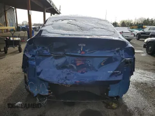 2020 Tesla Model Y Long Range z VIN 5YJYGDEE8LF029553, wystawiony jako Copart lot #51010665 z przebiegiem 42 877 mil mil oraz Szkoda całkowita • Salvage title. Historia ofert i sprzedaży dostępna na DreamBid. Obrazek 6.