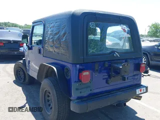 1997 Jeep Wrangler SE z VIN 1J4FY29P8VP400766, wystawiony jako IAAI lot #42270265 z przebiegiem 191 283 mil mil oraz . Historia ofert i sprzedaży dostępna na DreamBid. Obrazek 3.