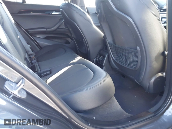 2022 BMW X2 xDrive28i z VIN WBXYJ1C05N5U40472, wystawiony jako IAAI lot #41433452 z przebiegiem 67 801 mil mil oraz . Historia ofert i sprzedaży dostępna na DreamBid. Obrazek 7.