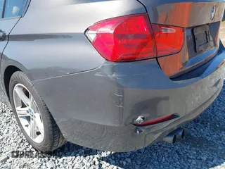 2014 BMW 3 Series 328i with VIN WBA3A5G57ENP28138, listed as a IAAI auction lot 41760371 with 147,897 mi miles and . Bid and sale history available at DreamBid. Image 6.