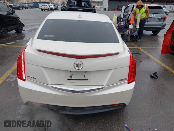 2013 Cadillac ATS Luxury z VIN 1G6AB5RA1D0156368, wystawiony jako IAAI lot #41283194 z przebiegiem 95 770 mil mil oraz . Historia ofert i sprzedaży dostępna na DreamBid. Obrazek 6.